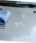 Get Those Dings Gone With These 50 Silver Metal Car Body Repair Welding Studs 4mm on a vehicle hood with a blue cloth.