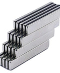 Heavy Duty Badass Neodymium Bar Magnets, 24 Pack Rare Earth Kickass Adhesive Backing stacked in rows, silver finish.