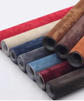Rolls of various colored self-adhesive leather repair patches for couches, sofas, car seats, and furniture.