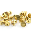 Top Notch Solid Brass Sam Browne Screw Studs With Nail Round Rivet Ends Great For Kickass DIY Leather Projects Belt Hardware Bag Embellishments And Sneaker Customizing Eight Piece Set Six Millimeter Heads scattered on white background.