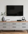 Ten Pack 5 Inch 128mm Hole Center Matte Black Cabinet Pulls Solid Zinc Alloy Drawer Handles on modern gray chest under TV.