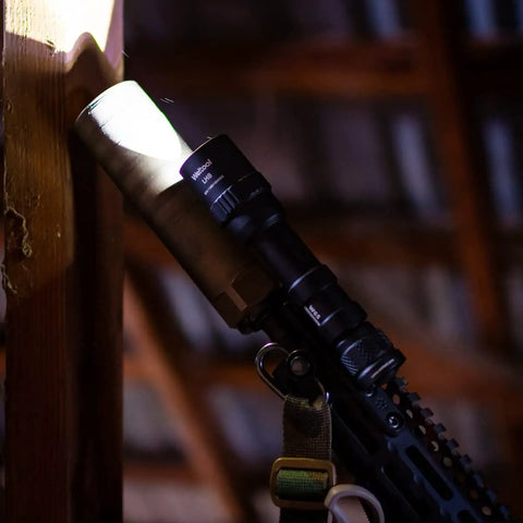 LH8 V2 Weapon Light Head Potted 5700K, 128000 CD, 1650 LM, mounted on tactical setup in dimly lit area
