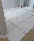 Ultra Thin 0.5mm Tile Leveling System With 2000 Spacers For Floor And Wall Installations in use on white floor tiles