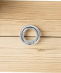 Close-up of M8 304 stainless steel lifting eye nut on wooden surface, part of 8 Pack M8 304 Stainless Steel Lifting Eye Nuts Heavy Duty Threaded Rigging Hardware With No Fuss Setup For Marine Hoisting And Industrial Job Site Work Built Tough.