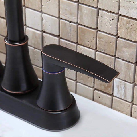 Close-up of Lead Free Two Handle Oil Rubbed Bronze Bathroom Sink Faucet With 360 Degree Swivel High Arc Spout Four Inch Centerset