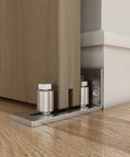 Wall mounted floor guide with adjustable rollers, stainless steel, showing flush bottom design for 2.125 inch thick doors.