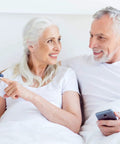 Older couple using Fingertip Pulse Oximeter With Batteries Included For Quick SpO2 And Pulse Rate Readouts, Large LED Display, Navy Blue, Built For Athletes, Travelers, Climbers, Runners And Everyday Health Enthusiasts