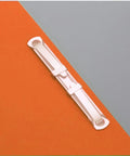 Heavy Duty Tempered Steel Prong Paper Fastener Bases 100 Pack Fits Standard Two Hole Punches Built Damn Tough lying on colored paper.