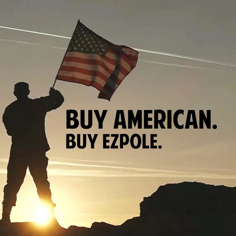 Silhouette of man holding American flag with 'Buy American. Buy EZPOLE.' text, promoting Defender Inground Flag Pole Kit Built Tough For Outdoors.