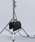 Beefy Heavy Duty Photography Sandbag Weight Bag With Oxford Cloth Foldable And Portable stabilizing a light stand.