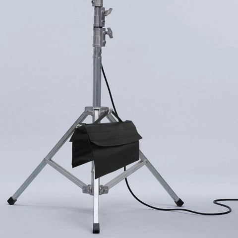 Beefy Heavy Duty Photography Sandbag Weight Bag With Oxford Cloth Foldable And Portable stabilizing a light stand.