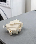 Direct Replacement Washing Machine Drain Pump Motor 4681EN1008A A000253 QC22-1 XPQ-6A Replacement Part white plastic housing, 12x6x6 cm, on washer surface