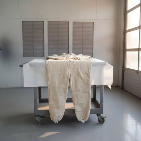 Canvas Sandblasting Suit With Hood Full Body Dustproof Workwear For Grinding And Sanding In Factory Workshops Hardcore Protection And Comfortable Fit Durable Grit Proof Coverall For Maintenance Jobs, beige canvas coverall on table