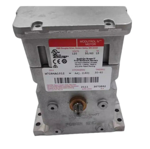 Heavy Duty Electric Damper Actuator M7284A1012 straight motor design for HVAC systems, showing label and mounting details.