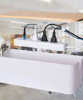 2 Pack Large Cable Management Box Set With Wooden Style Cord Organizer And Cover For TV Wires in white ABS material in office.