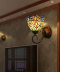 Dragonfly Stained Glass Tiffany Style Wall Lights Two Pack With LED E26 Bulbs Included, illuminating a living room wall.