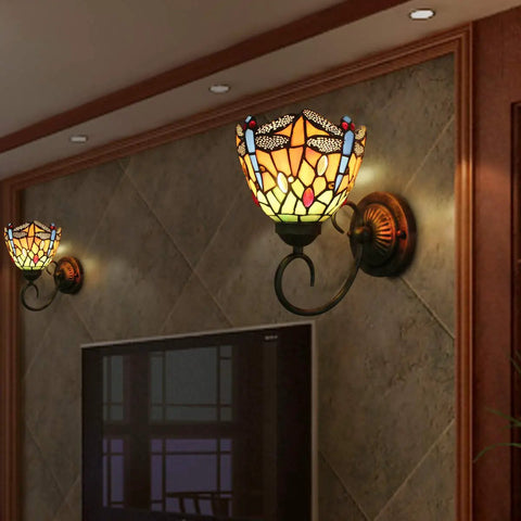 Dragonfly Stained Glass Tiffany Style Wall Lights Two Pack With LED E26 Bulbs Included, illuminating a living room wall.