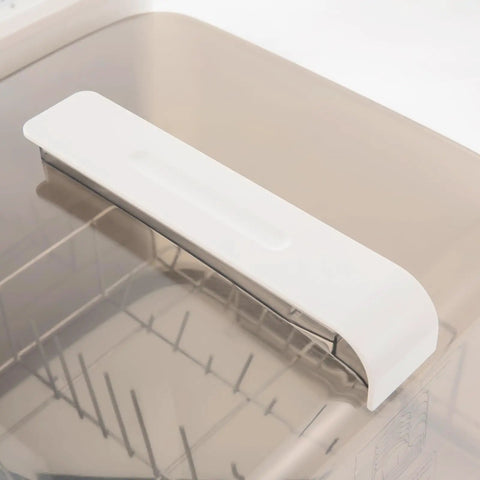 Portable Countertop Mini Dishwasher With 360 Degree Rotating Spray Heads And 1.59 Gallon Tank top view of white lid and interior features.