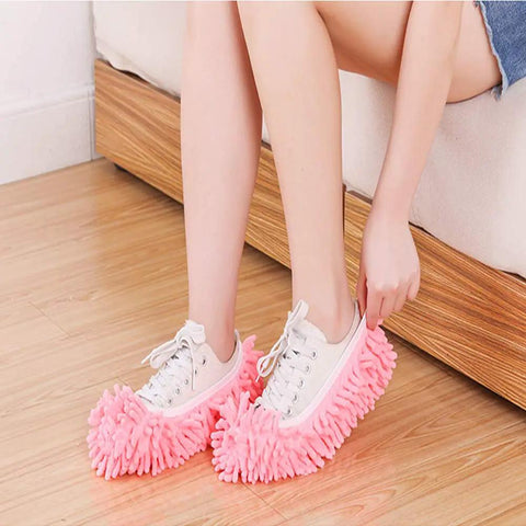 Woman wearing Ultra Soft Microfiber Mop Slippers 5 Pairs 10 Pieces Washable Reusable Floor Cleaning Shoes Covers No Sweat Easy Clean Chenille Foot Socks Eleven By Four Point Seven Inches Adjustable Color Purple Green Pink Blue Orange, in pink color.