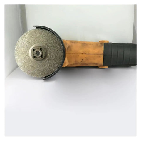 Angle grinder with Double Sided Lapidary Diamond Grinding Disc Wheel, 4 Inch Ceramic Disk attached, designed for gemstone polishing.