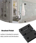 Ultra Heavy Duty Shower Glass Door Hinges Matte Black Two Way Pivot Hardware Built Different For Frameless Bathroom Doors 8 To 12 Millimeter Thick Badass Rust Proof Smooth Swivel 2 Pack displayed in modern bathroom.