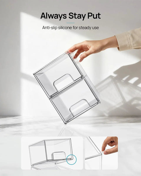 Hand holding Compact Clear Stackable Storage Drawers Four Pack Super Sleek Plastic Organizer Bins for narrow spaces.