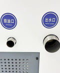 Close-up of oil drain and water outlet on Heavy Duty Pneumatic Chip And Sludge Remover For CNC Machining Shops.