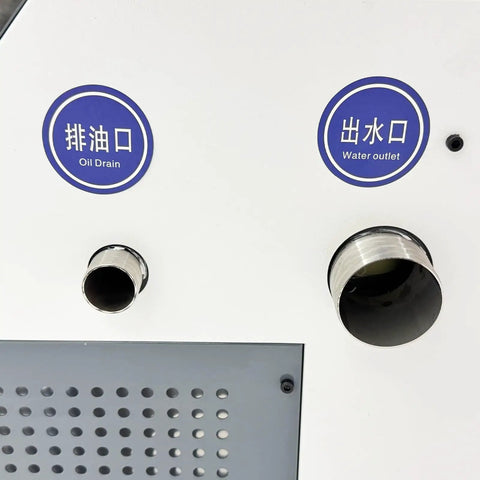 Close-up of oil drain and water outlet on Heavy Duty Pneumatic Chip And Sludge Remover For CNC Machining Shops.
