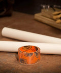 Crystal Clear Heavy Duty Duct Tape 1.88 Inch By 9 Yard Weatherproof All Purpose Tape on workbench with tools in background.