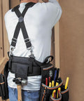 Person wearing Rugged Cordura Suspenders With Heavy Duty Padding For Electricians And Carpenters, working with tools.