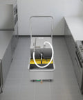 Heavy Duty Commercial Fryer Oil Filter Machine With Cart 55L Stainless Steel Storage Tank 550W Motor in kitchen.