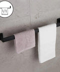 24 Inch Contemporary Stainless Steel Towel Bar Wall Mount with Slick Matte Black Finish holding two towels