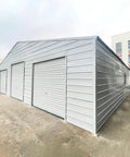 Heavy Duty Steel Barn Garage With Roll Top Metal Doors For Trucks Tractors Rvs Atvs And Workhorses Storage Shelter Backyard Outdoor Rig Canopy, side view, grey steel exterior.