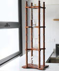 Generous Eighty Four Oz Cold Brew Drip Tower Iced Coffee Maker With Hand Blown Glass Vessel And Solid Wood Base displayed in kitchen