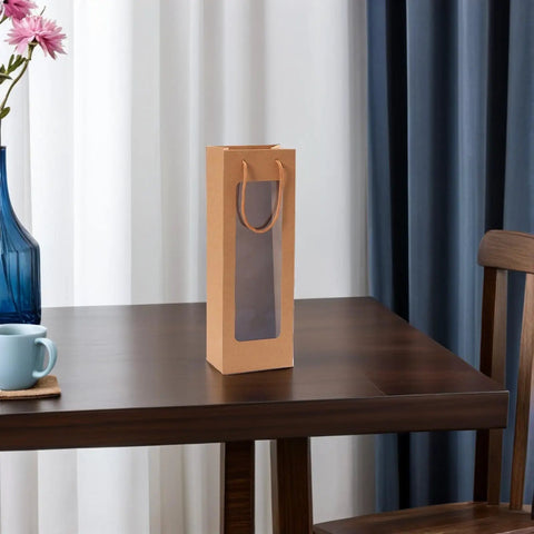 Kraft Paper Wine Bags With Window And Handles 24 Pack Elegant Brown Tote Bags For Birthdays And Weddings on table