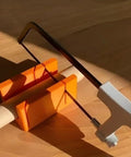 Compact 90 Degree And 45 Degree Cutting Guide For Woodworking, Portable Miter And Straight Cut Helper With Clear Markings On Rails, Easy To Store In Your Toolbox, Hassle Free Outdoor Projects, orange guide on wood