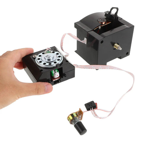 Quartz Clock Movement Repair Kit For Cuckoo Wall Clocks with long shaft mechanism and connected components in hand.