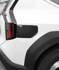Premium ABS EV Charging Port Cover Trim For Hyundai Kia EV9 2024 To 2025, carbon fiber pattern, installed on vehicle side.