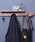 Badass Wall Mounted Coat Rack and Multi Slot Key Hook Solid Wood Construction with Brass Hooks to Hang Coats Jackets Handbags Hats Umbrellas Heavy Duty Build Sweet Entryway Decor featuring a black coat and umbrella.