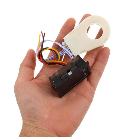 Compact Digital DC Volt And Amp Meter With Hall Effect Sensor Dual LED Display For Cars Boats And Rv showing hand-held size and wiring.