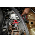 Mechanic using M18 FUEL 1/2 Inch Hi Torque And 3/8 Inch MTIW Automotive Combo Kit Red 3010-22 on car engine in garage