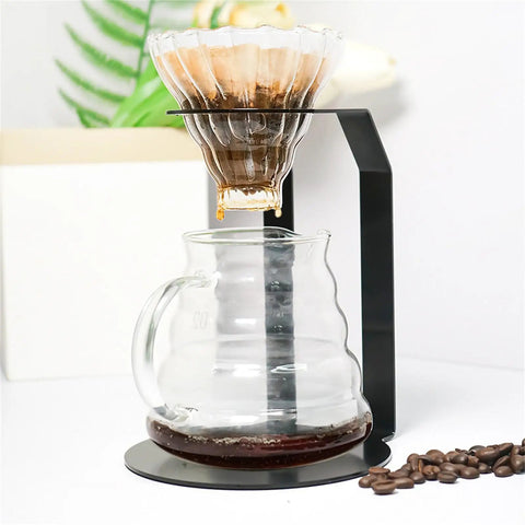 Kick Your Morning Routine Upstairs With This Rock Solid Iron Brew Station Perfect For Home Baristas Seeking Consistent Heat And A Go To Pour Over Setup Always On Point - Iron pour over stand with glass dripper and coffee pot.
