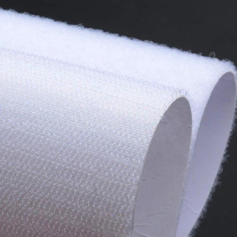 Close-up of white Stick On 2x4 Inch Hook And Loop Tape Set 12 Sets No Holes Or Screws Sticky Back Fastener with industrial strength adhesive