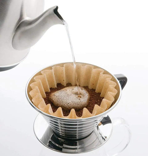 Pouring hot water into Wave Design Pour Over Dripper 185 For Cafe-Quality, Balanced Extraction And Rich Full-Bodied Coffee At Home