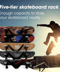 Five Tier Skateboard Wall Mount Rack With Rustic Wood And Black Steel Hooks For Tight Garages holds five colorful longboards securely.
