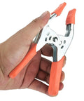Heavy Duty Metal Spring Clamps With Ergonomic Handles Built Tough For Woodworking Carpentry And Model Making Red Coated Shop Essentials Straight Up Dependable Workhorse in hand with comfort grip