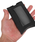 Hand holding a single black kraft paper pillow gift box with window, part of 50 Pack Black Kraft Paper Pillow Gift Boxes With Window For Birthday Parties And Events