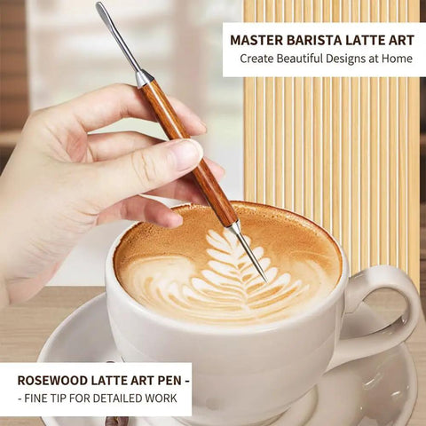 Hand using rosewood latte art pen to design a coffee in a white cup on a table