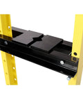 Close-up of the Hardcore 12 Ton Hydraulic Shop Press With Pressure Gauge and Rock Solid Steel Frame Bottle Jack Rig's black pressing plate.