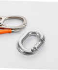 Pro Grade 316 Marine Stainless Steel Chain Link Connector Quick Connect Clip on white background next to scissors.